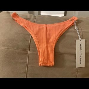 ORANGE WHITE FOX SWIM